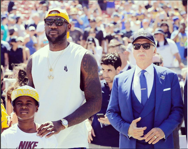Lebron James stands with Los Angeles Rams owner Stan Kroenke before the Sunday's Rams-Seahawks games in LA.